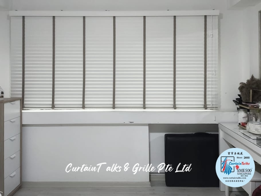 This is a Picture of Wooden blinds installed at Singapore HDB 736 Tampines Street 72 common room